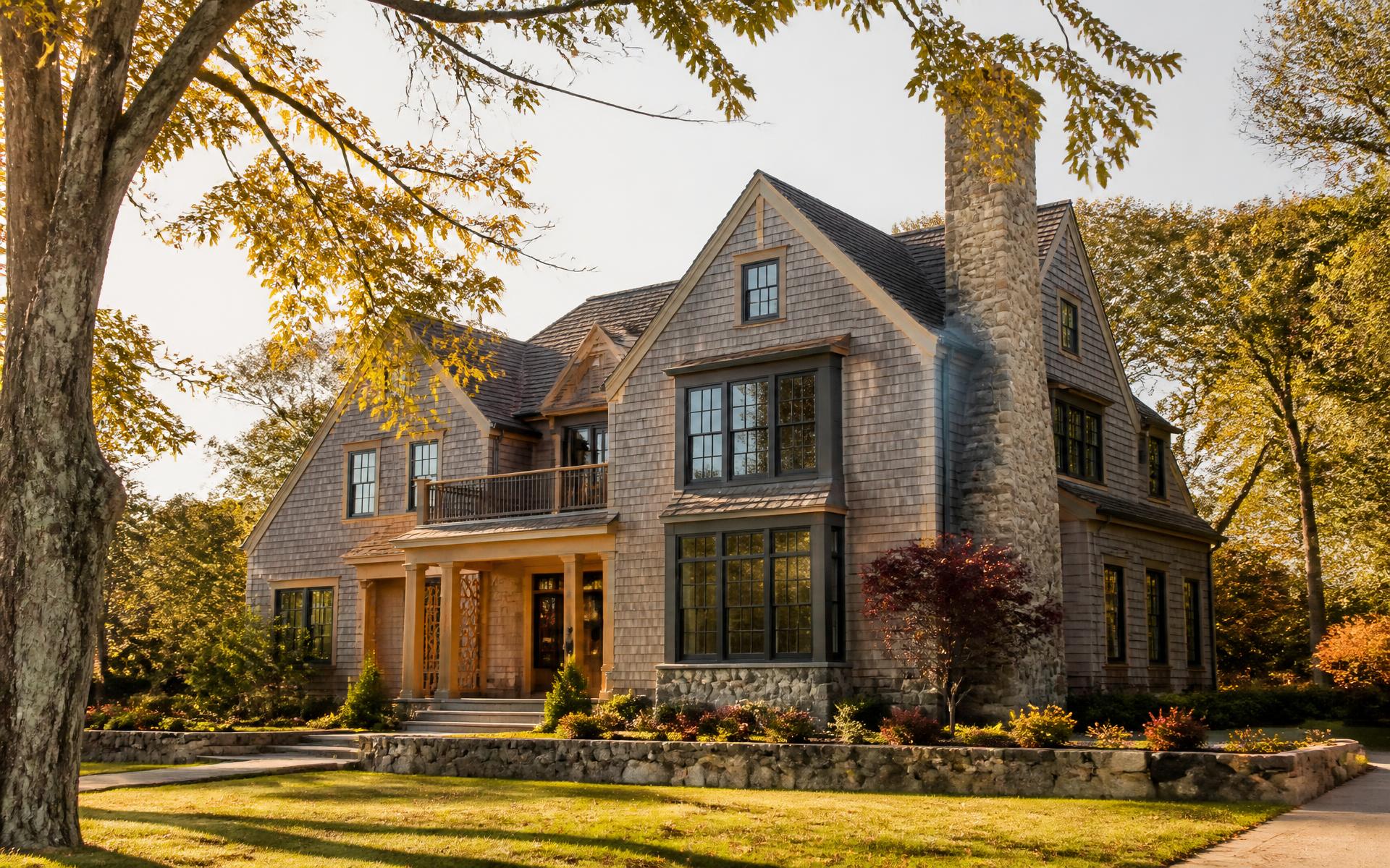 Completed shingle-style New England home renovated by Northline Builders